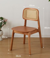 Chaise de salle à manger en rotin moderne de luxe avec accoudoirs, couleur bois naturel massif, pour restaurant et hôtel, vente en gros