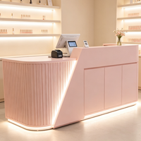 Comptoir de réception personnalisé de qualité pour magasin, en rose cannelé