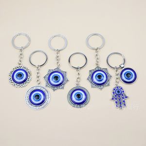 Hamsa mano de Fátima ojos <span class=keywords><strong>del</strong></span> <span class=keywords><strong>diablo</strong></span> mal de ojo llavero amuleto Vintage mal de ojo joyería Hamsa mano esmalte bolsa encantos colgante Decoración - Product Image 4