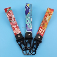 Dragonne personnalisée en cuir, porte-clés de voiture en tissu de haute qualité, cordon court en nylon, dragonne de téléphone durable