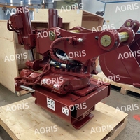 Poignées hydrauliques pour excavatrices avec support dorsal pour les opérations de défrichage