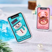 Coffret cadeau de lotion corporelle solide 10g*2, édition Noël, avec un renne et un bonhomme de neige dans une boîte portable, idéal comme cadeau festif.