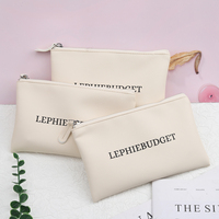 Logo personnalisé blanc PU fermeture éclair pièce de monnaie sac d'emballage en gros cosmétique fermeture éclair Pu pochette en cuir