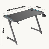 Bureau de jeu en forme de Z Wquantum avec porte-gobelet et crochet pour casque, surface en mélamine, assemblage requis pour une utilisation à domicile