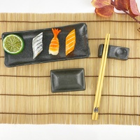 Ensemble de vaisselle en céramique personnalisé par le fabricant, assiette à sauce noire avec tapis en bambou et baguettes pour restaurant occidental