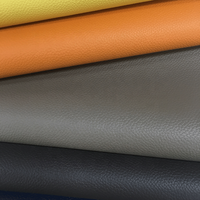 Tissu souple en cuir PVC artificiel gaufré de couleur orange 1.0mm Imitation cuir Rexine pour vêtements et rembourrage de voiture