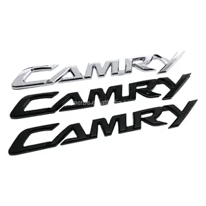 変更された車のロゴ車のステッカーエンブレムバッジフェンダーサイドリアトランクロゴ日産CAMRY用プラスチックカーエンブレムバッジ