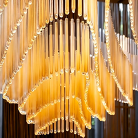 Lustre en cristal de grande taille OEM ODM, luminaire suspendu LED anti-éblouissement, éclairage moderne minimaliste sur mesure pour salle de bal d'hôtel
