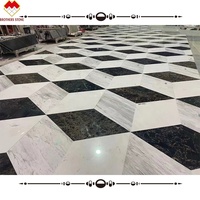 Tuiles de mosaïque en marbre noir en forme de cube magique personnalisées, projet hôtelier, marbre irrégulier, jet d'eau, médaillon, design de tapis