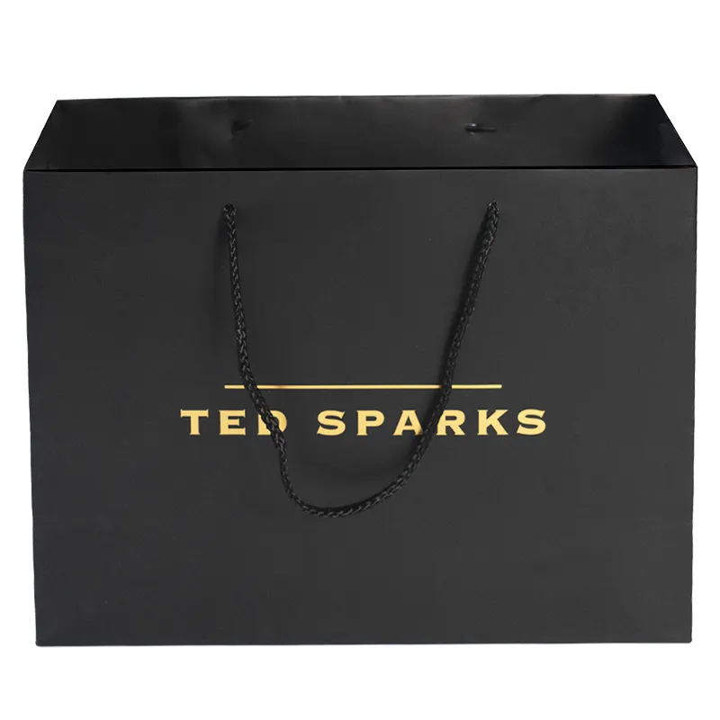 Lujo personalizado oro caliente estampado al por menor compras regalo bolsa de papel embalaje boutique bolsas bolsa de papel mate negro con su propio logotipo