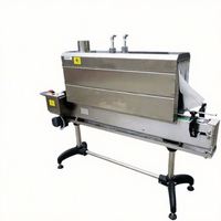 Petite machine semi-automatique d'étiquetage, d'emballage et de rétraction thermique pour bouteilles en plastique PVC
