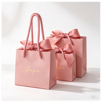 Sacs en papier perforés personnalisés pour les boutiques de vêtements, les cadeaux, les emballages d'achats, les sacs en papier pour bijoux