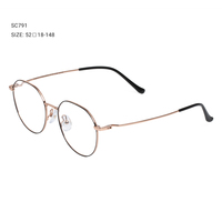 Lunettes légères et élégantes avec des branches super fines, monture en métal rétro, verres transparents sans correction