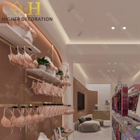 Comptoir en bois de haute qualité avec éclairage LED pour l'affichage de lingerie personnalisée en magasin, idéal pour la vente au détail