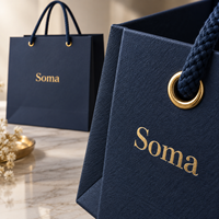 Sacs en papier personnalisés avec logo imprimé pour bijoux, montres et cadeaux haut de gamme, avec poignées en cordon tressé, pour une présentation de logo en relief.