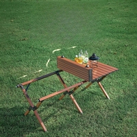 Table de camping pliante avec réchaud à gaz intégré et chaise enfant, pour une expérience de camping moderne