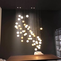 Lustre en verre moderne personnalisé, globe en verre moderne, luminaire de luxe pour hall d'hôtel, villa, luminaires en verre à bulles en spirale