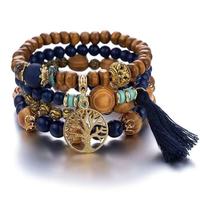 Ensemble de bracelets bohèmes multi-couches en perles de bois, élastiques, avec breloques à pompons, bijoux pour femme, cadeau, fête
