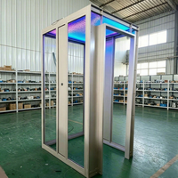 Cabine panoramique ronde personnalisée en acier inoxydable avec porte vitrée, panneau mural en marbre et éclairage LED au plafond pour ascenseur