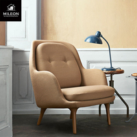 Fauteuil simple pour salon, style nordique, en cuir et tissu, inclinable, moderne, modèle hôtelier, fauteuil design personnalisé