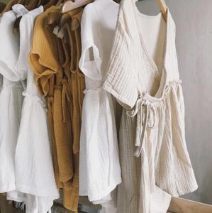 Ropa de Boutique para Niñas al por Mayor, Vestido de Algodón y Lino de Manga Corta con Cárdigan, Estilo Personalizado - Product Image 1