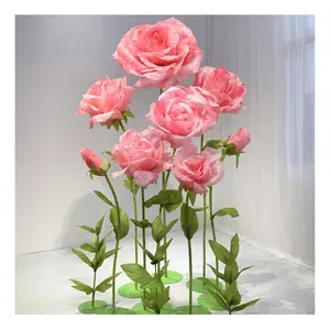 E146 Vente en gros de toile de fond pour fête de mariage fournisseur de fleurs roses géantes fleurs artificielles combinaison de roses plissées avec tige