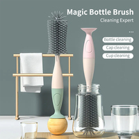 Nouvelle conception Brosse de nettoyage pour biberon en silicone 360° à long manche, sûre et durable, rose/bleue