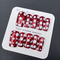 Ongles artificiels rectangulaires faits main de haute qualité, effet œil de chat rouge et cercle blanc, réutilisables, vente en gros pour usines