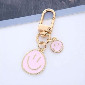 Manufacture Round Smile Metal Keychains Golden Zinc Alloy Offset Printing Stock Keyholder with Pendant Enamel Printed Keychains - Product Image 4
