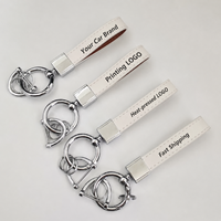 Porte-clés en cuir blanc avec logo automobile personnalisé, impression à chaud, anneau métallique, concessionnaire de véhicules, boutique 4S, fournisseur en gros, OEM