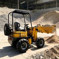 Elektrischer Mini-Radlader 4WD Batteriebetriebener Kleiner Frontlader Emissionsarm für Landwirtschaft Lager Innenbau