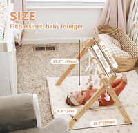 Portique d'éveil en bois pour bébé à prix abordable avec jouets suspendus