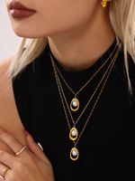 Collier ras du cou tendance pour femme en acier inoxydable 316L plaqué or PVD 18 carats avec pendentif perle d'eau douce et chaîne à maillons trombone