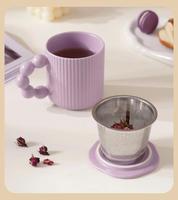 Vente en gros tasses à macarons personnalisées tasse de voyage en céramique avec couvercle tasse à thé de 12 oz avec passoire tasses à rayures mates