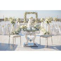 Magnifique ensemble de supports de table de mariage romantiques dorés, de luxe onirique, en acier inoxydable avec plateau en verre miroir, pour banquets et réceptions en extérieur