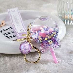 Cute Oil Liquid Lollipop Keychain Quicksand Snowflake Glitter Acrylic Floating Keyring Pendant for Women Backpack <b>Key</b> <b>Chains</b> - Product Image 1