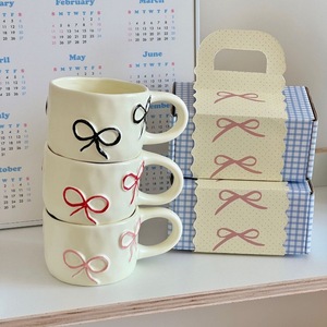 Wholesale Custom Embossed Bow Red Ceramic Coffee <b>Mug</b> <b>with</b> Spoon Portable Dishwasher Safe Cute Design for Back to School Gift - Product Image 1