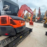 En stock : Excavatrice sur chenilles HITACHI 55 d'occasion avec système hydraulique d'origine pour travaux de terrassement à petite échelle