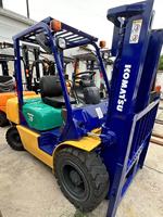 Chariot élévateur diesel Komatsu FD30 d'occasion, 3 tonnes, 4x4, pneus pleins, terrain accidenté, mât à deux étages, moteur 48KW, dimensions des fourches 1220x125x50