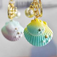 Coquille de mer porte-clés porte-clés océan série pendentif souvenir cadeau en gros créatif couleur conque coquillage perle porte-clés sac charme