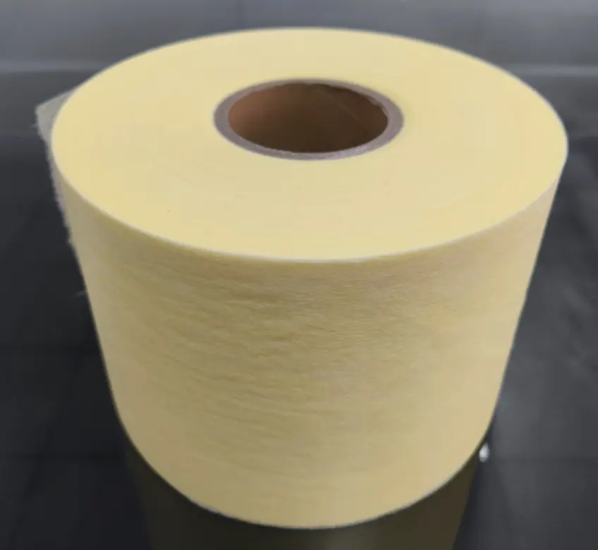 Vente chaude en gros de haute qualité 25gsm 100% PE/PET jaune hydrophile ADL de couche respirant Airthrough rouleau de tissu non tissé