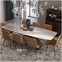 Table à manger design italienne unique plateau en marbre ensemble de table à manger en pierre nordique moderne et léger en forme de ventre de cheval