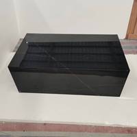 Table basse moderne ronde en marbre noir Marquina avec structure en acier inoxydable et matériaux naturels pour le salon