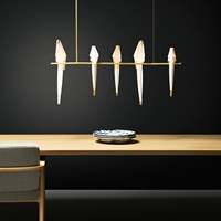 Vente en gros de chandelier sculptural d'oiseau style origami acrylique finition or blanc pour salle à manger moderne magasin de luxe pour enfants