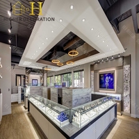 Vitrines de présentation en verre sur mesure pour bijouterie haut de gamme, éclairage LED commercial, design intérieur de magasin de bijoux, vitrine de présentation