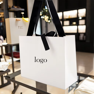 Fabrika doğrudan satış özel baskılı logo tasarım kağıt torbalar promosyon High-end giyim perakende hediye alışveriş takı hediye keseleri - Product Image 1