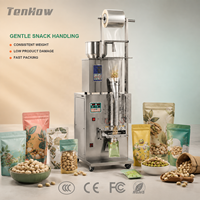 Machine d'emballage industrielle intelligente et durable pour sachets préformés de type oreiller, pour la production automatique de snacks aux pistaches