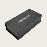 Boîte cadeau rigide magnétique en carton recyclable noir avec logo personnalisé, design pliable, matériaux recyclés, impression argentée