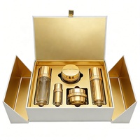 Boîte-cadeau de luxe OEM à double porte en carton pour ensemble de produits cosmétiques (shampoing, soins de la peau) avec poignée