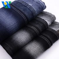 Tela vaquera de algodón 100% muy Slubby de 14oz, hilo OA Sirospun de alta calidad, rollos de tela vaquera sin urdimbre elástica, fabricante
